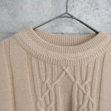 1990's イヴ・サンローラン カサンドラロゴ YSLロゴ アラン編み ケーブル編み ウール ニット セーター ベージュ 2XL相当 - NEWSED