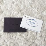 プラダ ポコノ テスート サファイアーノ ナイロン/レザー スマホホルダー ブラック 1ZT023 ストラップ付 - NEWSED