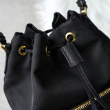 プラダ ポコノ テスート ナイロン サフィアーノ レザー 2way 巾着バッグ ショルダーバッグ トライアングルロゴ ブラック / ゴールド ギャランティーカード付き - NEWSED