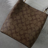 コーチ スモール タウン バケット バッグ シグネチャー 2way ショルダーバッグ ハンドバッグ ブラウン 2312 - NEWSED