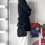 プラダ ポコノ テスート ナイロン サフィアーノ レザー 2way 巾着バッグ ショルダーバッグ トライアングルロゴ ブラック / ゴールド ギャランティーカード付き - NEWSED