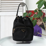 プラダ ポコノ テスート ナイロン サフィアーノ レザー 2way 巾着バッグ ショルダーバッグ トライアングルロゴ ブラック / ゴールド ギャランティーカード付き - NEWSED