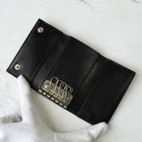 プラダ ポコノ ナイロン 三角プレート トライアングルロゴ サフィアーノ レザー 6連 キーケース ブラック - NEWSED