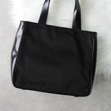 プラダ ナイロン / レザー ハンドバッグ トライアングルロゴ ブラック