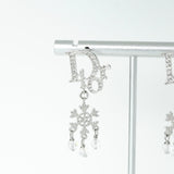 ディオール ロゴ ラインストーン スノー クリスタル ピアス シルバー