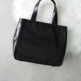 プラダ ナイロン / レザー ハンドバッグ トライアングルロゴ ブラック