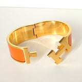 エルメス クリッククラックH PM バングル ゴールド/オレンジ 箱付き - NEWSED
