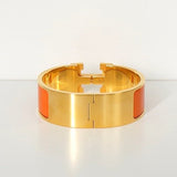 エルメス クリッククラックH PM バングル ゴールド/オレンジ 箱付き - NEWSED