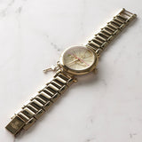 ヴィヴィアン ウエストウッド ケンジントンII オーブロゴ クォーツ 腕時計 シャンパンダイヤル ゴールドステンレススチール VV006KGD 動作品 - NEWSED