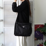 プラダ ポコノ テスートナイロン / レザー 三角プレート ショルダーバッグ ブラック - NEWSED