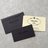 プラダ ポコノ テスート ナイロン ミニバックパック リュックサック 三角プレート カーキ グレー - NEWSED