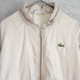 シュミーズ ラコステ ヴィンテージ フランス製 トラックジャケット ブルゾン ロゴパッチ ストライプ柄 ベージュ - NEWSED