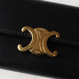 セリーヌ トリオンフ シャイニーカーフスキン コンパクトウォレット ブラック / ゴールド - NEWSED