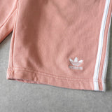 アディダス トレフォイルロゴ ショート スウェットパンツ サーモンピンク - NEWSED