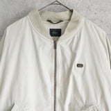 ラコステ ブルゾン スタジャン ロゴパッチ オフホワイト - NEWSED