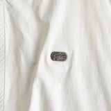 ラコステ ブルゾン スタジャン ロゴパッチ オフホワイト - NEWSED