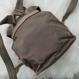 プラダ ポコノ テスート ナイロン ミニバックパック リュックサック 三角プレート カーキ グレー - NEWSED