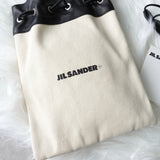 ジルサンダー ドローストリング キャンバス レザー 巾着型 ショルダーバッグ ポシェット アイボリー / ブラック タグ付き未使用 - NEWSED