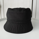 プラダ ポコノ テスート ナイロン バケットハット 帽子 三角プレート トライアングルロゴ ブラック - NEWSED