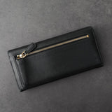 プラダ サフィアーノレザー 二つ折り長財布 ゴールド ブラック ギャランティーカード 箱付き - NEWSED