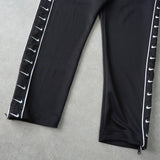 ナイキ ロゴ サイドライン トラックパンツ ブラック - NEWSED