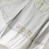 ラコステ バックロゴ ブルゾン ナイロンジャケット ロゴパッチ オフホワイト - NEWSED