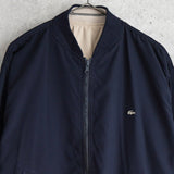 ラコステ リバーシブル ブルゾン スタジャン ロゴパッチ ダークネイビー/ベージュ - NEWSED