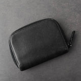 プラダ サフィアーノ レザー コインケース 三角プレート ラウンドジップ ブラック - NEWSED