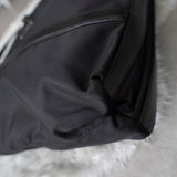 プラダ ポコノ テスート ナイロン サフィアーノレザー 三角プレート トートバッグ ブラック - NEWSED