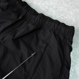 アレキサンダー ワン ロゴ シャーリング ナイロンパンツ トラックパンツ ブラック - NEWSED