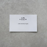 コーチ シグネチャー フラワー PVC トートバッグ ベージュ F66880 - NEWSED