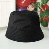 プラダ RE - NYLON ポコノ テスート ナイロン バケットハット 帽子 トライアングルロゴ ブラック / ゴールド - NEWSED