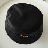 プラダ RE - NYLON ポコノ テスート ナイロン バケットハット 帽子 トライアングルロゴ ブラック / ゴールド - NEWSED