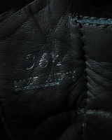 NEWSEDのPRADAモノリスRe-Nylonブーツのサイズ36.5が刻印されたブラックのレザー内側部分