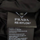 プラダ Re Nylon トライアングルロゴ ベルト付 ダウンコート ブラック IT 42 レディース 未使用品