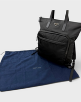 NEWSEDのPRADA Re-Nylon 2WAYバックパック。ブラックのリサイクルポリアミドとサフィアーノレザー製、保存袋付き。