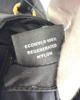 NEWSEDのPRADA Re-Nylonバッグの内側にあるECONYL 100%再生ナイロン素材を示すタグ