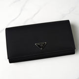 Prada nylon bifold wallet with triangle logo in black