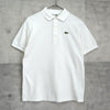 Lacoste 象牙色徽标贴片短袖 Polo 衫