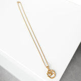 クレージュ ヴィンテージ ツイスト ロゴ ネックレス GP ゴールド