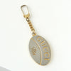 Gucci Plus 1970s-1980s Vintage Guarantee Medal Charm Strap in Silver/Gold Combination