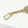 Gucci Plus 1970s-1980s Vintage Guarantee Medal Charm Strap in Silver/Gold Combination