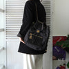 Chanel No. 2 旋锁 Matelasse 牛仔布/皮革背包（黑色）