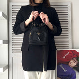 プラダ ポコノ テスート ナイロン サフィアーノ レザー 2way 巾着バッグ ショルダーバッグ トライアングルロゴ ブラック / ゴールド ギャランティーカード付き - NEWSED