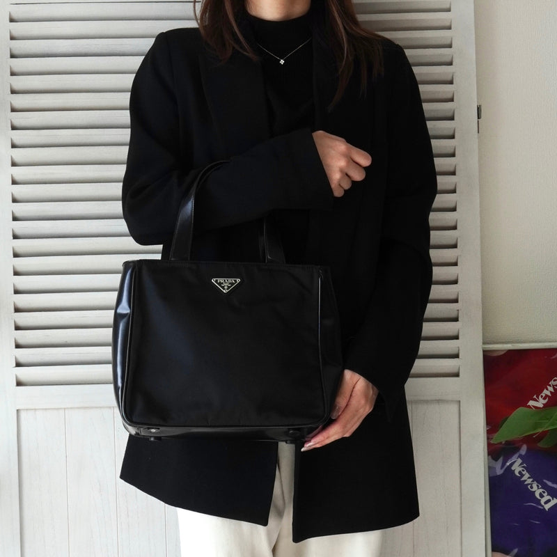 プラダ ナイロン / レザー ハンドバッグ トライアングルロゴ ブラック
