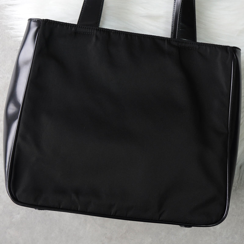 プラダ ナイロン / レザー ハンドバッグ トライアングルロゴ ブラック