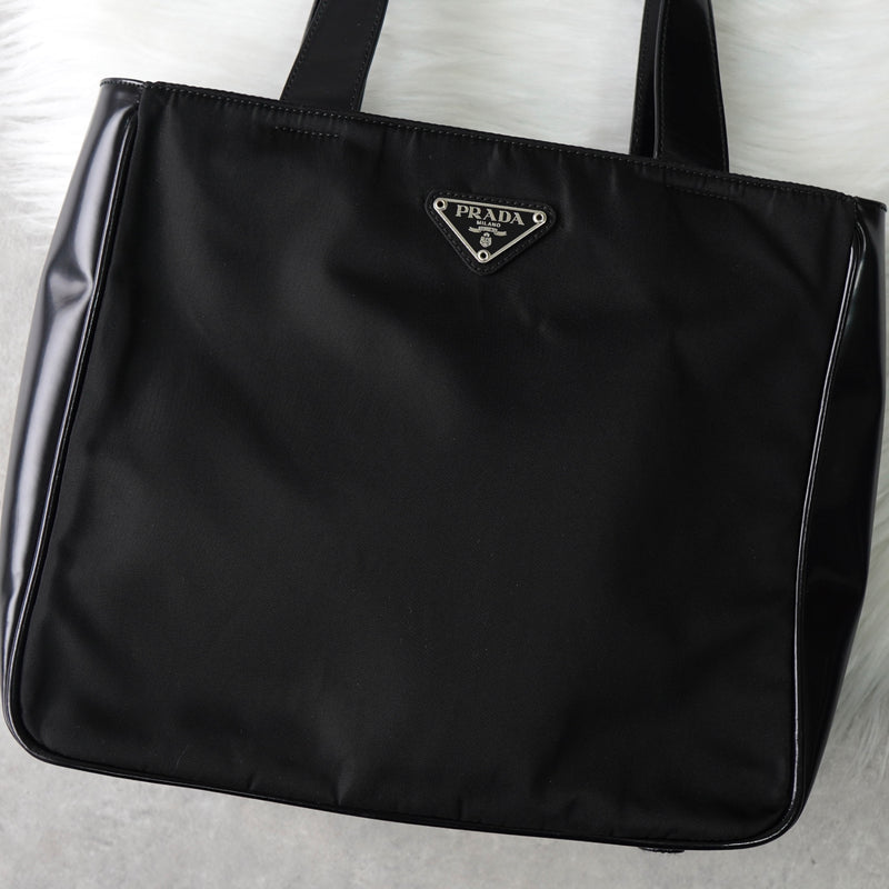 プラダ ナイロン / レザー ハンドバッグ トライアングルロゴ ブラック