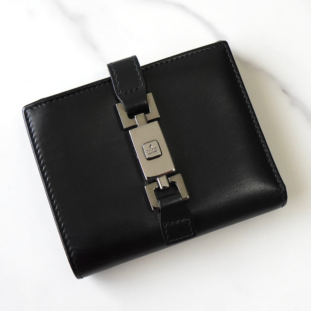 Gucci Jackie 黑色皮革双折紧凑型钱包
