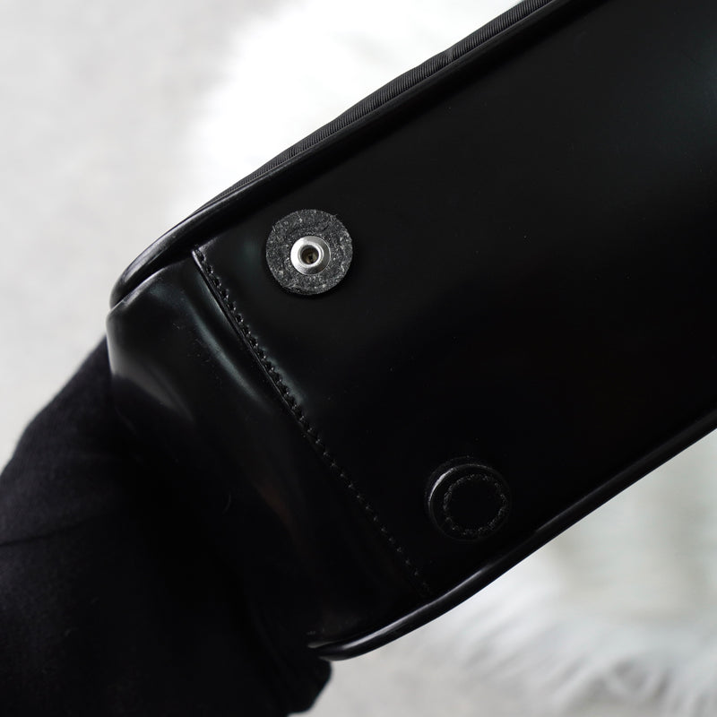 プラダ ナイロン / レザー ハンドバッグ トライアングルロゴ ブラック