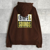 アベイシングエイプ (B)APE SOUNDS LOGO ZIP HOODIE プリント パーカー ブラウン